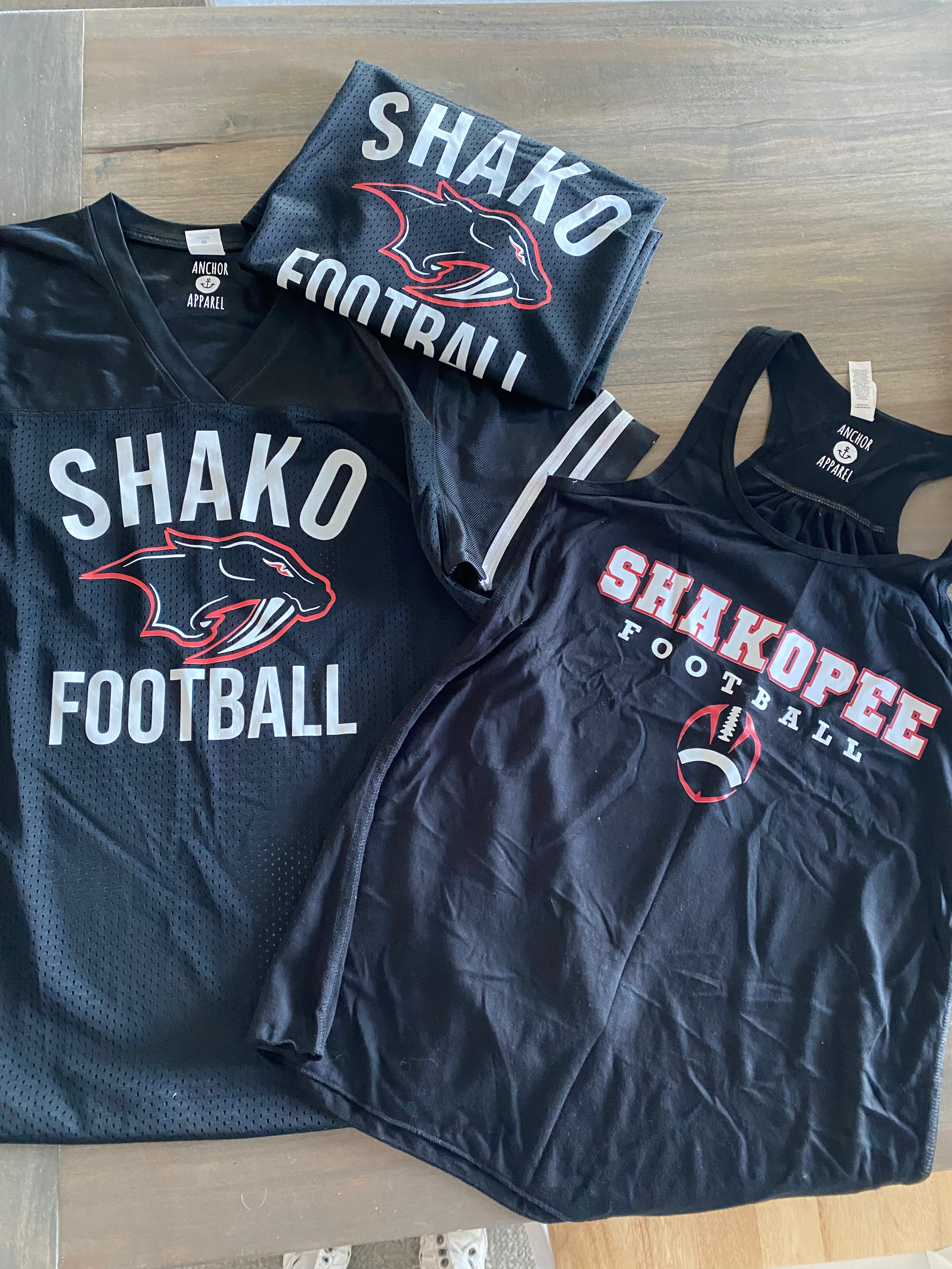 SHAKOPEE FOOTBALL COWL NECK OR TEE