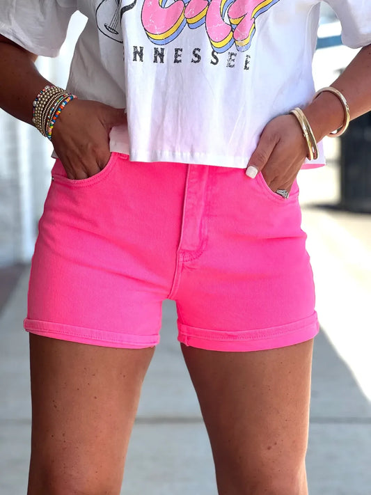 Neon pink jean shorts